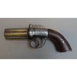 A 19th century six shot pepperpot pistol, with fluted barrel,