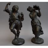 A pair of continental bronze figures, 19th century, cast as shepherd and shepherdess, both dancing,