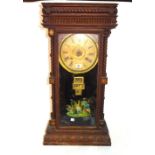 A 19th century 8 day wall clock with integral calendar 38cm wide x 77cm high.