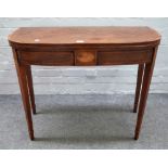 A George III inlaid mahogany 'D' shaped tea table, on tapering square supports,