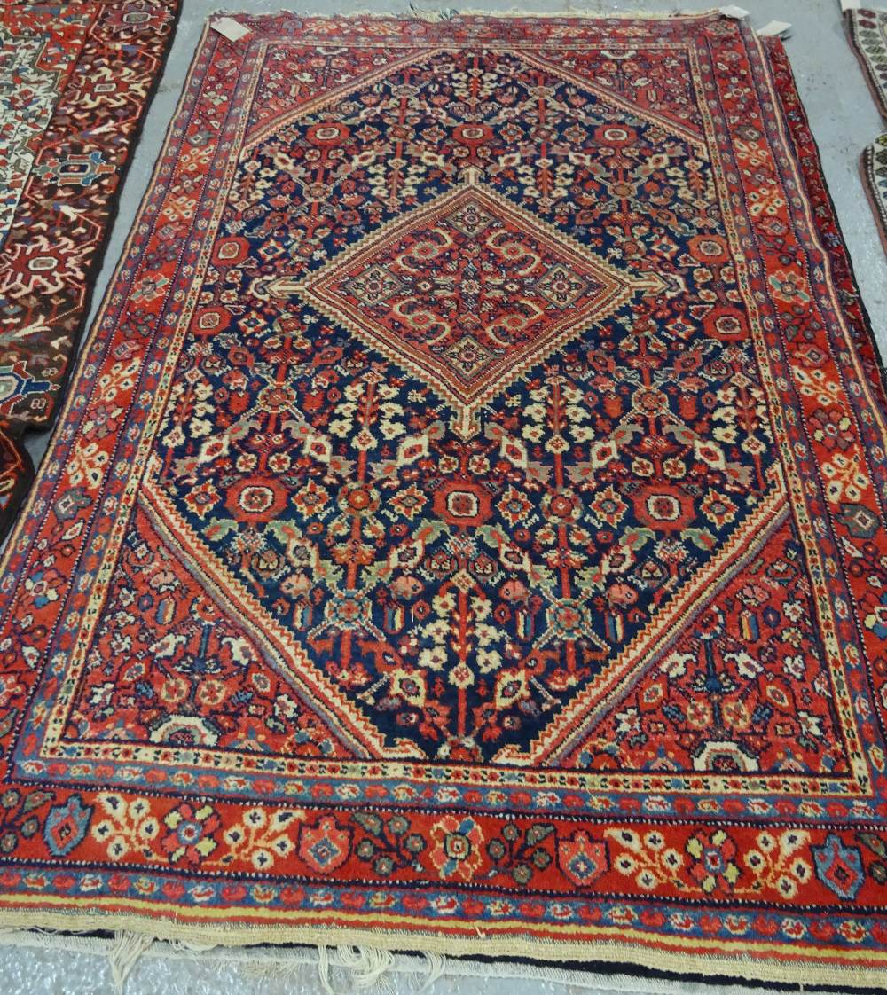 A Mahal rug, Persian, the dark indigo field with a madder central diamond, matching spandrels, - Image 3 of 6