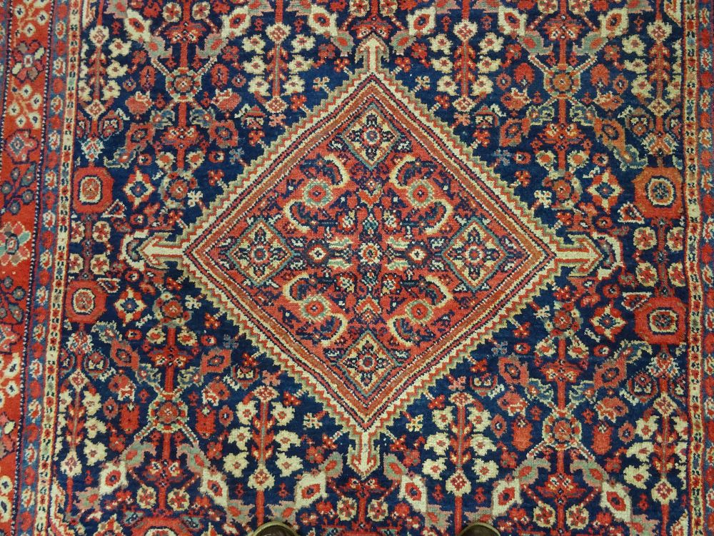 A Mahal rug, Persian, the dark indigo field with a madder central diamond, matching spandrels, - Image 5 of 6