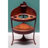 A Regency mahogany bowfront corner washstand, on splayed supports, 61cm wide x 114cm high.