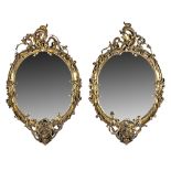 A pair of Victorian gilt framed girandole wall mirrors,