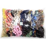 A large collection of mostly costume jewellery, including bead and other necklaces, bangles,