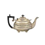 A silver three piece tea set, comprising; a teapot, a twin handled sugar bowl and a milk jug,