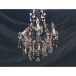 A modern gilt metal five branch chandelier,