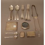 Silver, comprising; two pairs of sugar tongs, a pair of salt spoons, London 1829,
