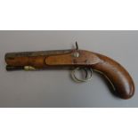 An early 19th century percussion overcoat pistol by Trulock & Son, Dublin, converted from flintlock,