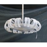 A modern frosted and clear glass ceiling light with central glass rod suspending a circular dish