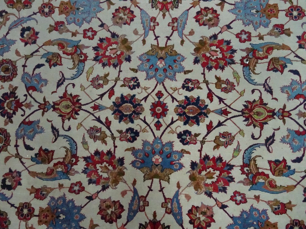 Isfahan carpet, Persian, the ivory field with all over palmette and floral sprays, - Image 4 of 6