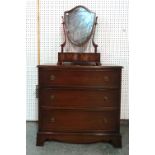 A 20th century mahogany chest of three long drawers on bracket feet,