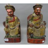A pair of Chinese gilt and painted wood figures of officials, 19th century,