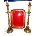 A pair of 20th century brass altar candlesticks on tapering columns and hexagonal bases,