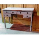An early 20th century blue painted kneehole desk with four drawers on tapering square supports,