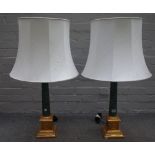 A pair of Victorian style green faux marble and gilt metal mounted table lamps,