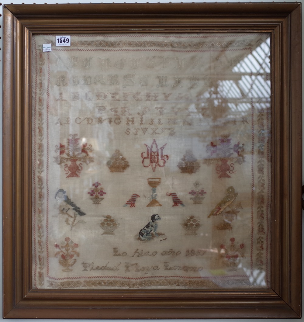 A woodwork alphabet sampler dated 1897, indistinctly signed,