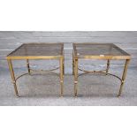 A pair of mid-20th century square lacquered brass and glass occasional tables on reeded supports,