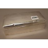 A late Victorian silver rectangular table cigarette box, wooden lined within,