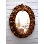 A 19th century Italian gilt framed mirror, with pierced and floral moulded frame,