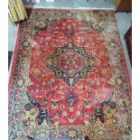 A machine made carpet of Persian design, 360 x 274cm.