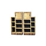 In the manner of Heals; a pair of mid-20th century bleached oak and ebony shelf units,