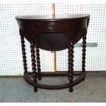 An 18th century style oak bowfront single drawer drop flap side table on barleytwist supports,