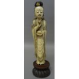 A Chinese ivory figure of Guanyin, early 20th century,