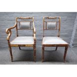 A set of eight Regency style dining chairs, with faux painted wood grain finish,
