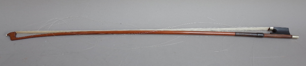 A French silver mounted violin bow stamped 'D'APRES SIMON',