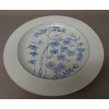 A Chinese porcelain large blue and white plate, first half 18th century,