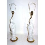 A pair of 20th century white porcelain Chinese figural table lamps, (2) 66cm high.