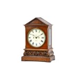 A German oak cased mantel clock with painted metal dial detailed 'Pugh London' over a frieze