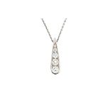 A white gold and diamond pendant necklace,