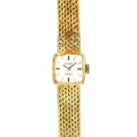 A Rexora gold lady's bracelet wristwatch,