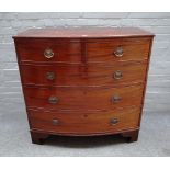 A Regency mahogany bowfront chest of two short and three long graduated drawers on bracket feet,