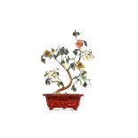 A Chinese hardstone tree in a cinnabar lacquer jardiniere, 19th,