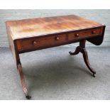 A George III mahogany sofa table with pair of frieze drawers and dummy opposing on four downswept
