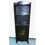 An early 20th century ebonised and floral painted three tier bookcase cupboard,