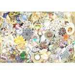 A collection of approximately one hundred and eighty costume brooches and pins,