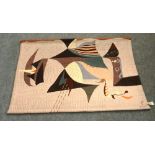 A woven modern panel with a stylized abstract design, Carl Esorral, Exec Quina, 130cm x 190cm.
