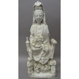 A Chinese blanc de chine figure of Guanyin, 18th/19th century,