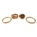 A 22ct gold plain wedding ring, Birmingham 1935, a gold wedding ring, detailed GALT 18B KT,