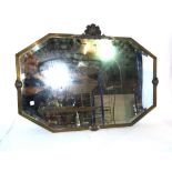 A 20th century octagonal brass framed mirror, 78cm wide x 62cm high.