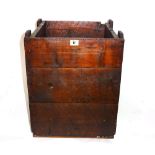 A 20th century stained pine square bucket with rope handles, 34cm wide.