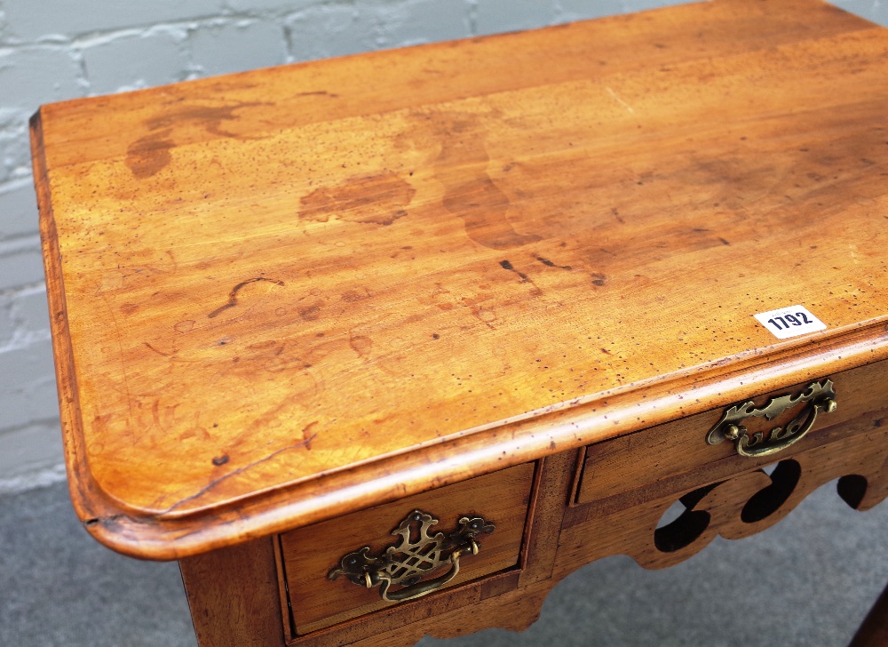 A mid-19th century walnut lowboy with two drawers about the pierced frieze on tapering turned - Image 3 of 3