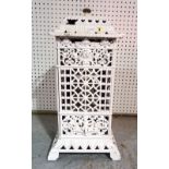 A white painted cast iron cathedral heater, 30cm wide x 60cm tall.