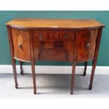 A Regency inlaid mahogany bowfront sideboard, of small proportions, with four frieze drawers,
