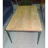 A 20th century hardwood rectangular coffee table on tapering metal supports,