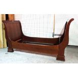 A 20th century mahogany framed sleigh day bed, 81cm wide x 91cm high.